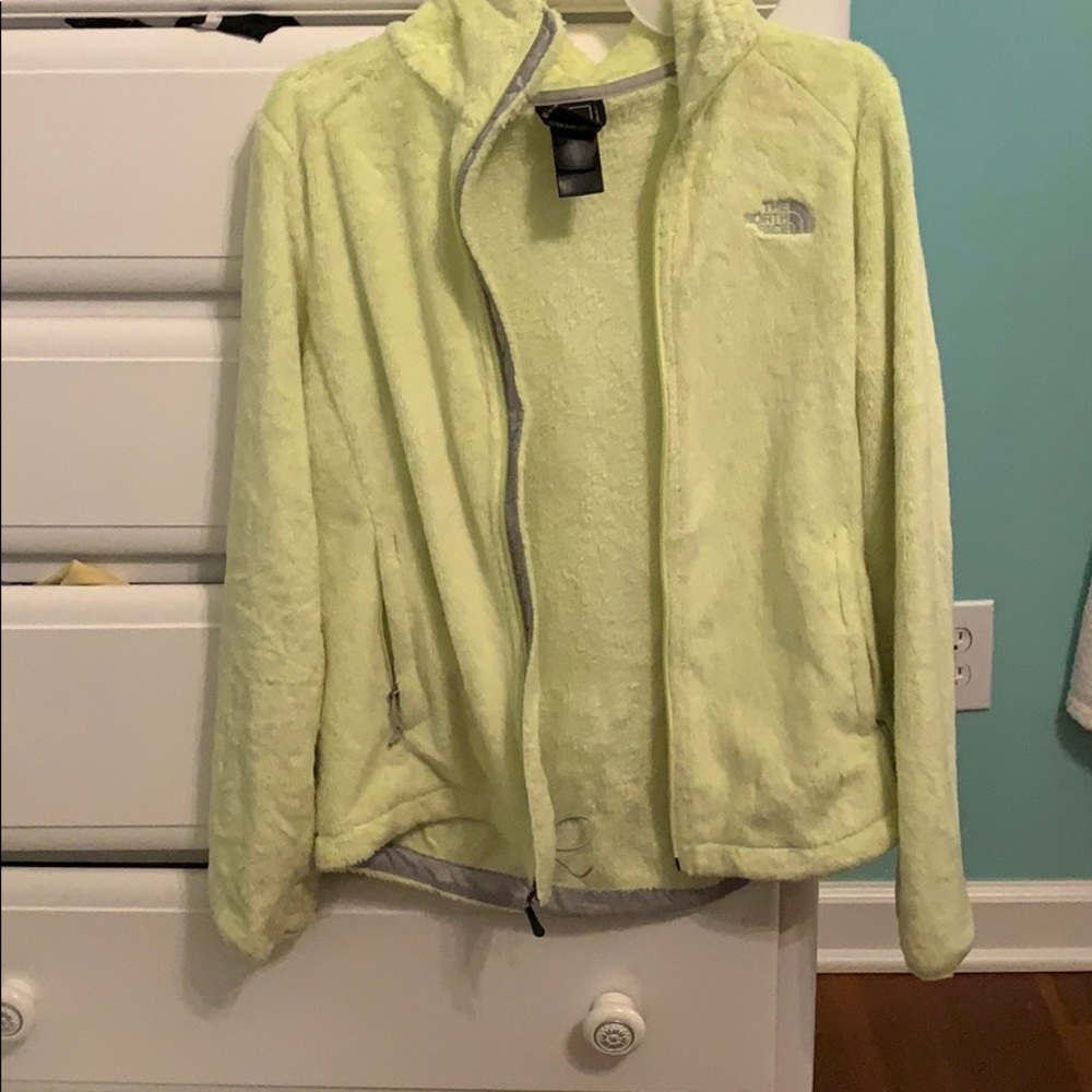 Neon yellow north face jacket.